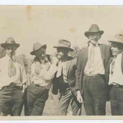 Young Men Wearing Cowboy Hats