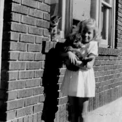 Girl Holding Dog