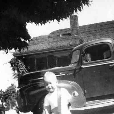 Child Near Butcher House