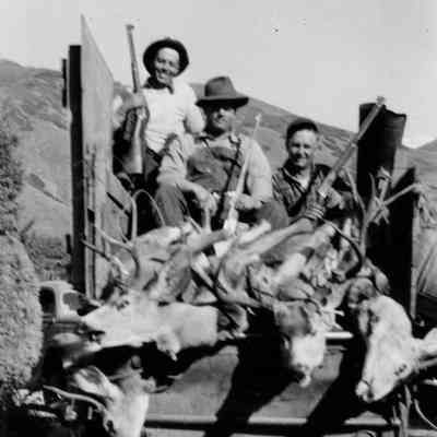 Men with Guns and Deer