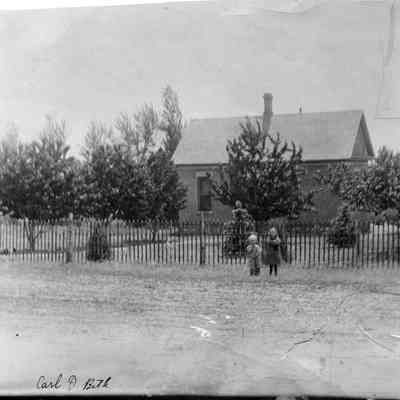 Children Outside of House