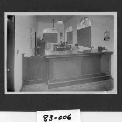 Twin City Creamery office, counter, staff, of the Twin City Creamery.  Identified are Mabel Qualley, Katie Estep Hinman, Evelyn Edwards Lyons.  Photo of interior office, equipment, furnishings