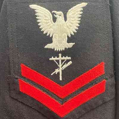 Closeup of the U.S. Navy patch, two stripes indicates an E-6 rank.