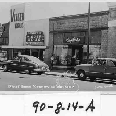 Kennewick Ave, with Neuman's Market, Visger Drug and English's Clothing store.