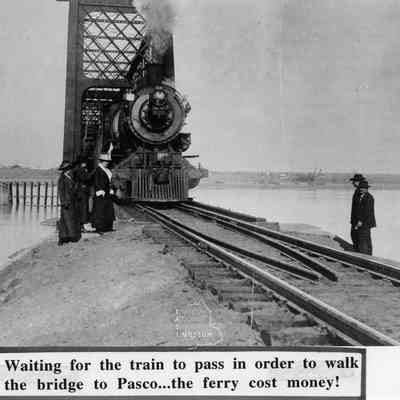 Waiting for the train to pass in order to walk the bridge to Pasco