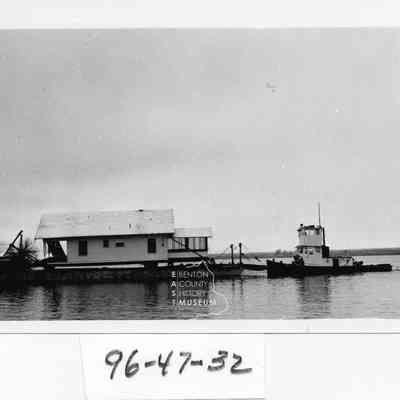 House moving on the river.