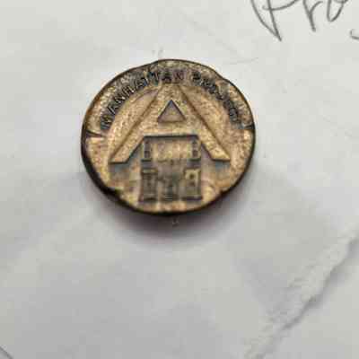 Pin with "Manhattan Project A Bomb" and castle for the corporate of engineers