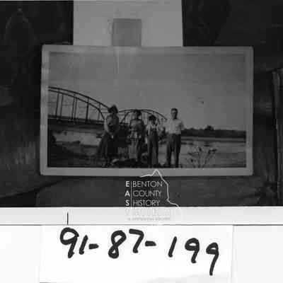 The Fallon Bridge 1920 was named after Mrs. Fallon who took her horse and buggy and made the rounds to farm families with a petition to build a bridge so the school children wo lived in what is now West Richland would not have to ford the river to go to school. L/R: Glady Chellis, Lucille Harmon, Francis Mitchell, and Ed. Flannigan. The brige now standing was built in 1923.