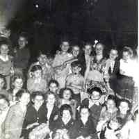 B+W copy photo of image of children at a block party in Willow Terrace on V.J. day 1945.