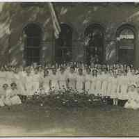 B+W photo of Our Lady of Grace School group photo of girls with Mabel Bolles, Hoboken, n.d., ca. 1906.