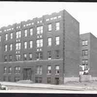 B&W photo of apartment building at 125 Corbin Avenue, Jersey City.