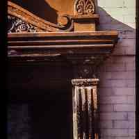          Color slide of detail view of pediment, finial and bracket on a building at an unidentified location picture number 1
   