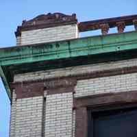          56: detail top cornice south facade near Bloomfield St.
   