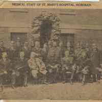 Newspaper clipping from album with photo of Medical Staff of St. Mary