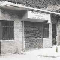 B+W photo of an entrance gate to the Maxwell House Coffee plant, 1101 Hudson St., Hoboken, no date, ca. 1980-1992.