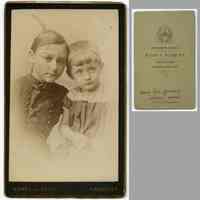          2: young woman or girl with girl or boy ca. 3-5 years old
   