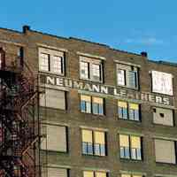 Color photo of painted wall signage for Neumann Leathers, 300 Observer Highway, Hoboken, Jan. 3 & 4, 2002.