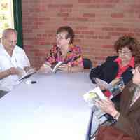 Digital images, 40, of reception celebrating the publication of Tom Olivieri oral history chapbook in HHM walkway, May 21, 2005.