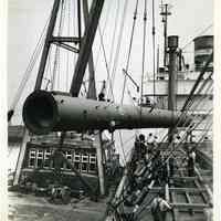 B+W photos, 5, of the loading of industrial fixtures as deck cargo on unidentified Holland America Line ship, Hoboken, n.d., ca. 1947-1952.