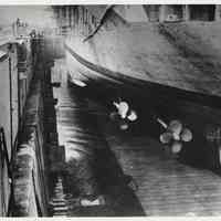          photo 7: similar to 6; dock is near pumped dry; propellers not submerged
   