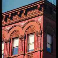          Color slide of detail view of cornice, brick pilasters, and arched windows at 938 Washington at the intersection of Washington & 10th picture number 1
   