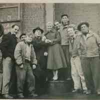 B+W group photo of "On the Waterfront" filming in Hoboken: Karl Malden is fourth from the left, Eva Marie Saint is next to him.