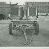 Group of 3 B+W photos of two welding generators on a trolley at the Bethlehem Steel Shipyard, Hoboken Division, no date (ca 1950.)
