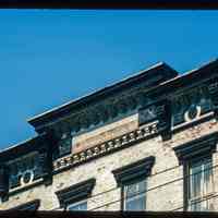 Color slide of close-up view of cornice at 554 Observer Highway between Monroe and Madison