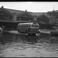          1: bus and automobiles in a flooded Lackawanna Plaza
   