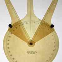          protractor out of case; arms spread
   