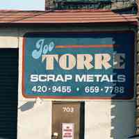 Color photo of painted sign on wall for Joe Torre Scrap Metals, 703 Adams Street, Hoboken, Jan. 3 & 4, 2002.