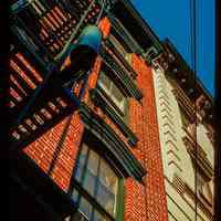          Color slide of detail view of cornices, brick pilaster, fire escape and window pediments at 204 3rd & 300 Garden picture number 1
   