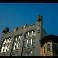          Color slide of close-up view of roofline ornamentation and upper floor windows at 70 Hudson Street and the cornice of 72 Hudson Street on the NW corner of Hudson Place picture number 1
   