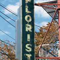 Color photo of Florist sign hanging on 364 Sixth St., Hoboken, Sept., 1-5, 2001.