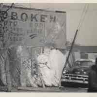 B+W photo of Hoboken Police pound fence & Hoboken Auto Body, 620 Jackson St., Hoboken, no date, ca. 1970-1975.