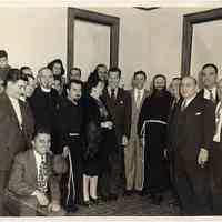 B+W group photo with Frank Sinatra, Dolly Sinatra, Franciscan friars & others, in St. Francis Church, Hoboken, n.d., ca. 1936-1939.