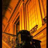 Color slide of interior detail view of the Lackawanna Terminal waiting room staircase, railing and wall