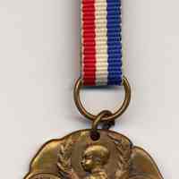          medal with ribbon as received
   