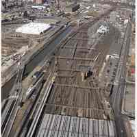 Digital color image of aerial view of Hoboken Terminal passenger sheds and train yard looking west from the Hudson River, Hoboken, no date, [2004].