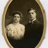 Sepia-tone oval portrait of woman and man posed in studio, no place (Hoboken?), n.d., ca. 1900-1920.