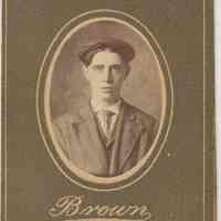 Sepia-tone photo of an unidentified boy posed in studio, Hoboken, no date, ca. 1890-1910.