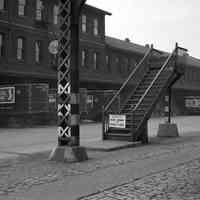 B+W photo negative of PSCT bus station (stop) on Observer Highway at Bloomfield St., Hoboken, 1949.