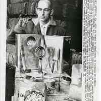 B+W photo of nut sampler John Koslowsky inspecting shipments at Pier C, Hoboken, March 1, 1961.