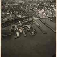 B+W aerial photo of Pennsylvania R.R. Marine Dept. piers & shops, Hoboken, Nov. 30, 1961.