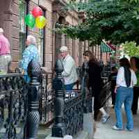          12 2011 Garden Tour: group entering a home on the tour
   