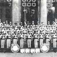 Digital image of photocopy of published b+w photo of Our Lady of Grace Lancers posed on the front steps of Demarest High School, Hoboken, no date, ca.