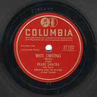 Record: "White Christmas." Vocal by Frank Sinatra. With The Bobby Tucker Singers. Conducted by Axel Stordahl. Columbia Records. 78 rpm. No.37152 [CO33