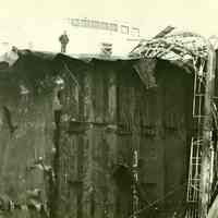 B+W photo of another closer view of major damage to an unidentified freight vessel in dry dock, possibly in Hoboken, no date, ca. 1940.