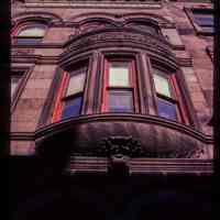          Color slide of close-up view of bay window, façade, semicircular arches and cornice at 1037 Bloomfield between 10th and 11th picture number 1
   