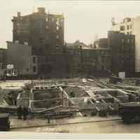 Sepia-tone photo of progress on foundation construction on the site for the Fabian Theatre, Newark & Washington Sts., Hoboken, Jan. 16, 1928.